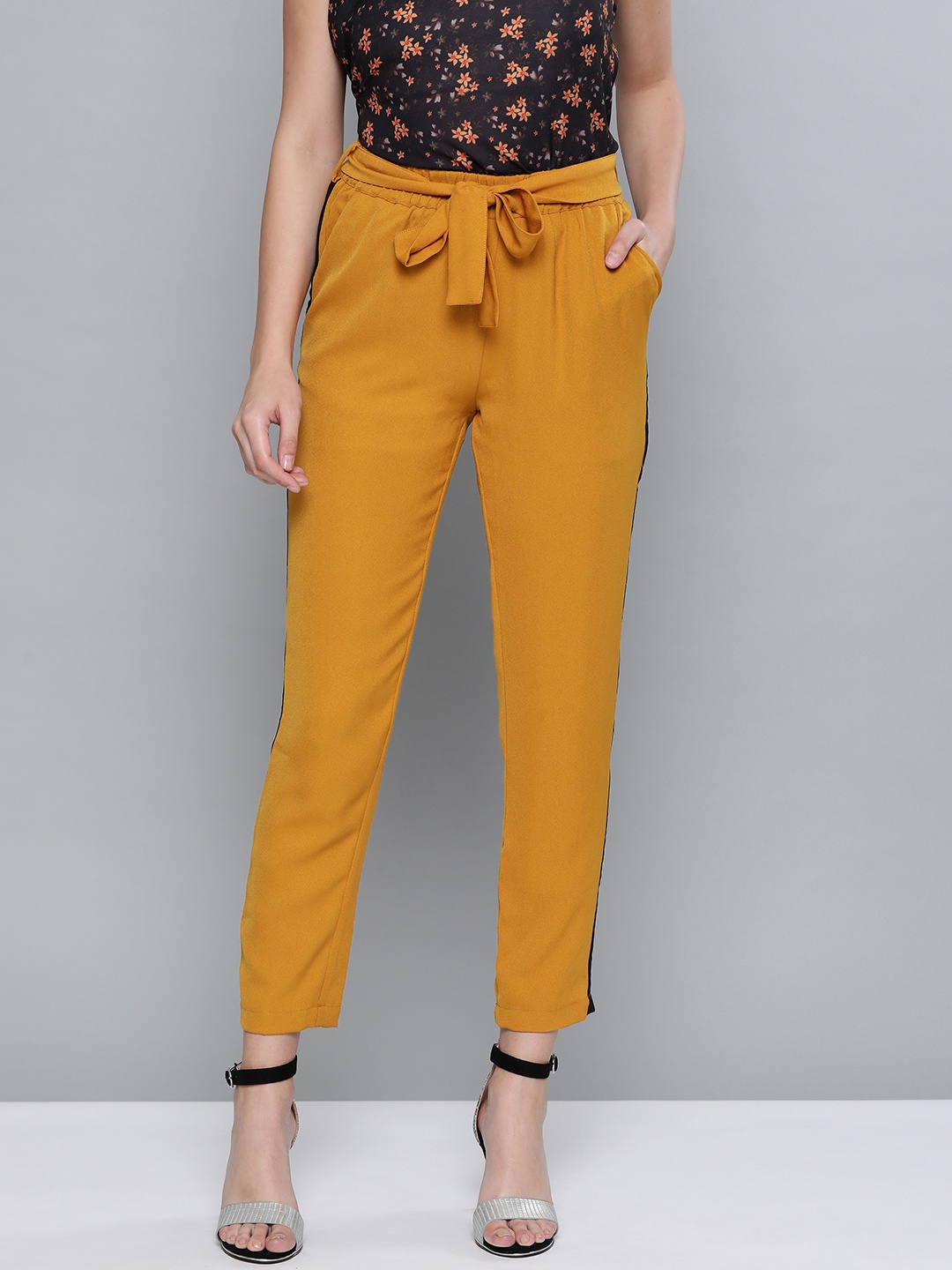 

SASSAFRAS Women Mustard Yellow Tapered Fit Solid Regular Trousers