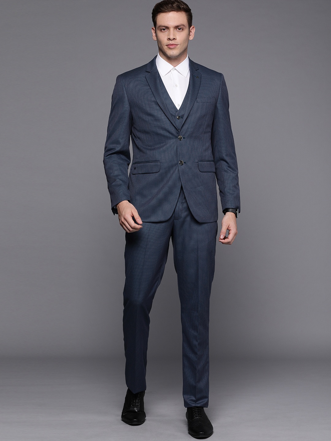 

Louis Philippe Men Navy Blue Self Design Single-Breasted Slim Fit Wedding Suit