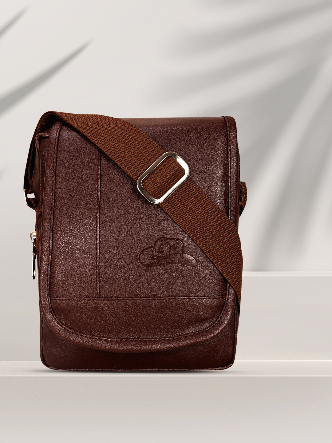 

Leather World Brown Solid Sling Bag