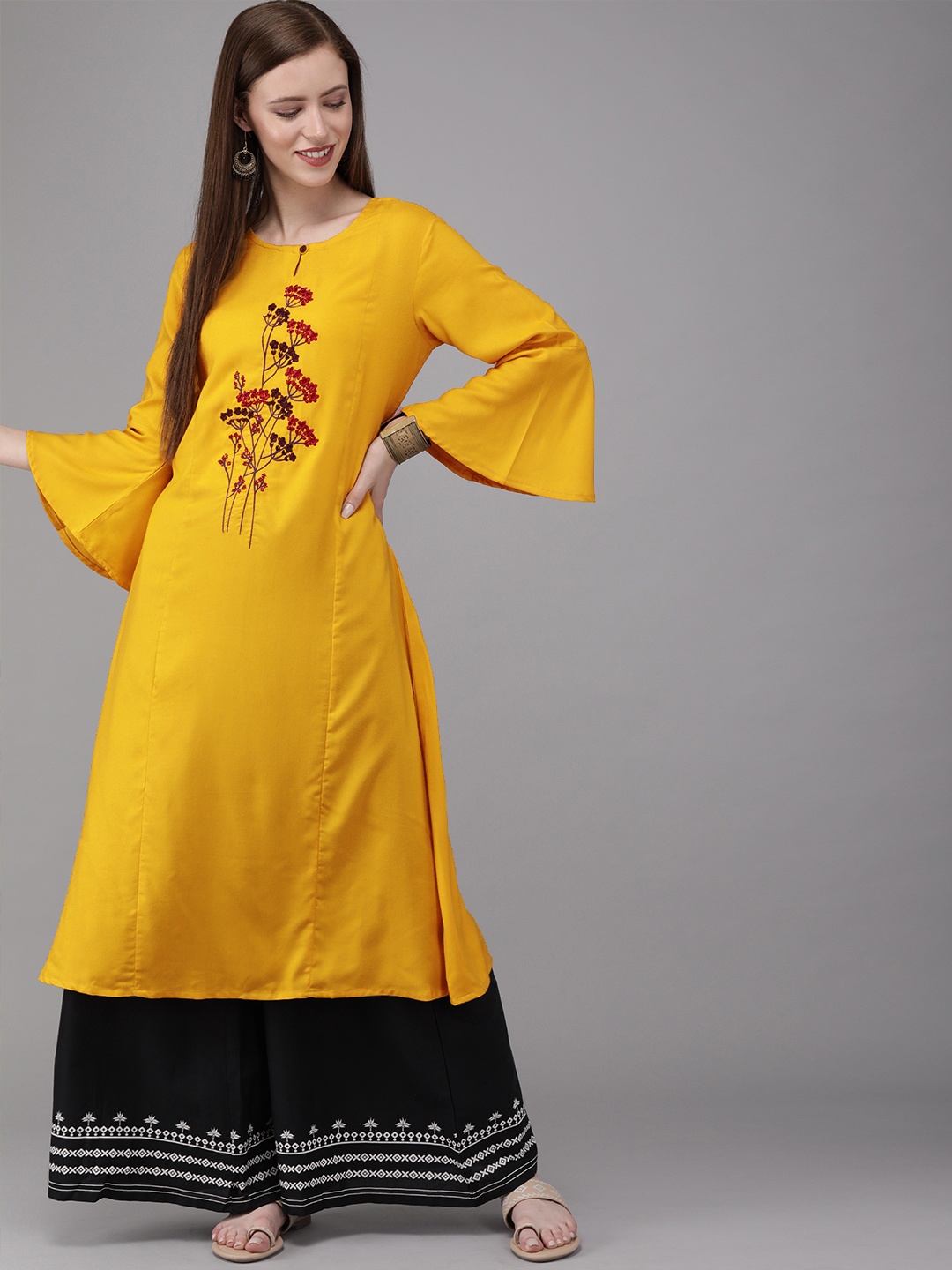 

MIMOSA Women Mustard Yellow Embroidered A-Line Kurta With Flared Sleeves