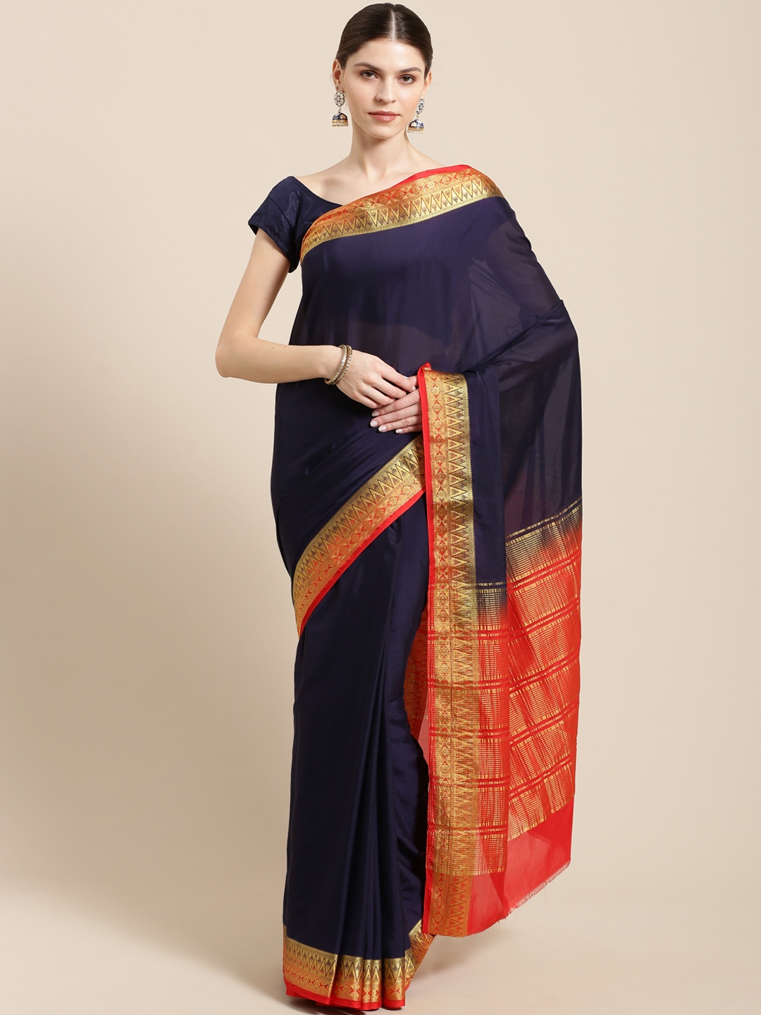 

Mitera Navy Blue & Orange Solid Kanjeevaram Saree