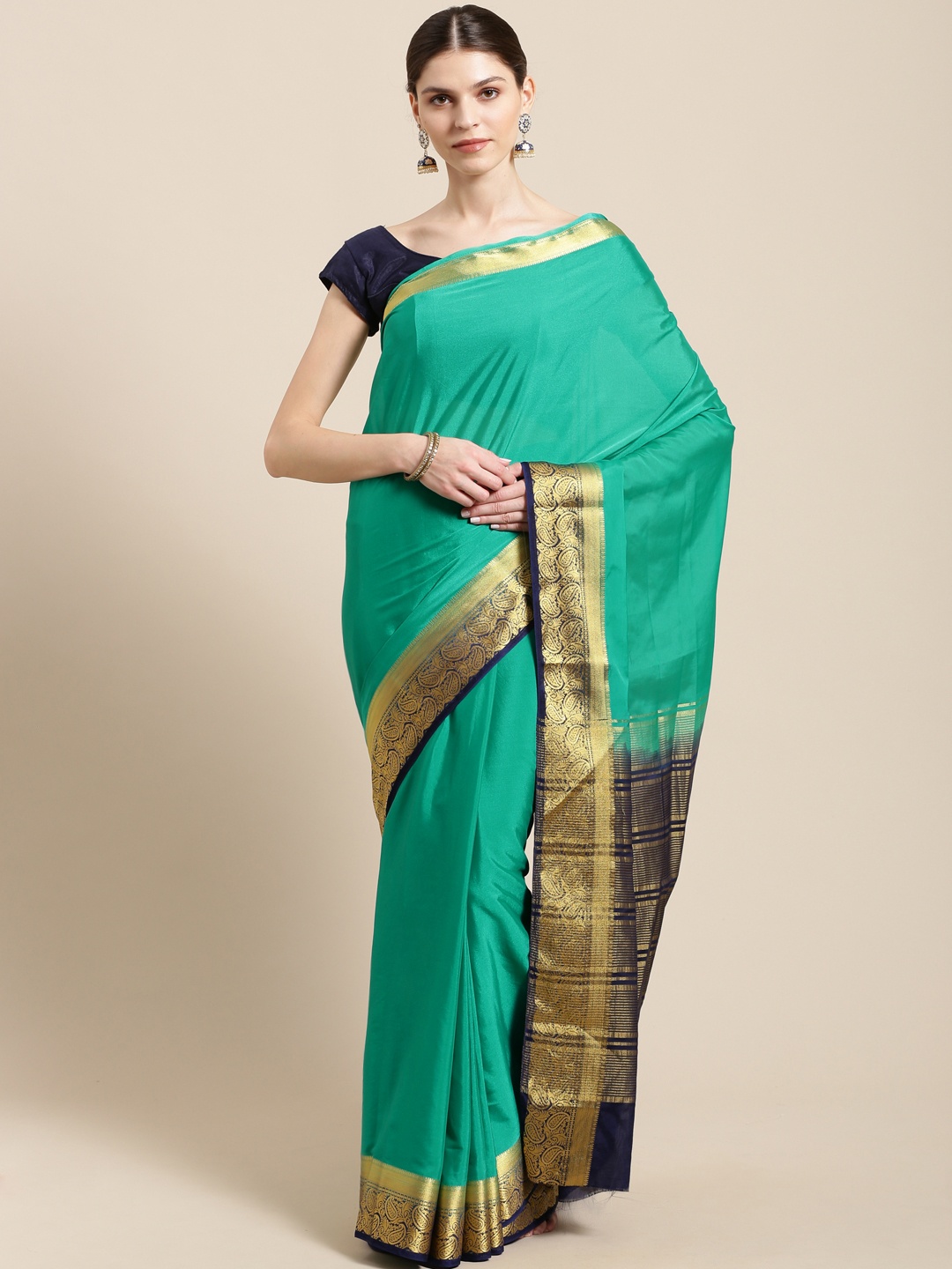 

Mitera Green Solid Kanjeevaram Saree