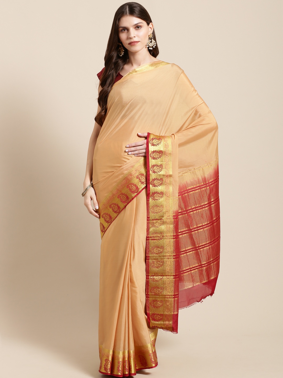 

Mitera Beige & Red Solid Kanjeevaram Saree With Zari Detail