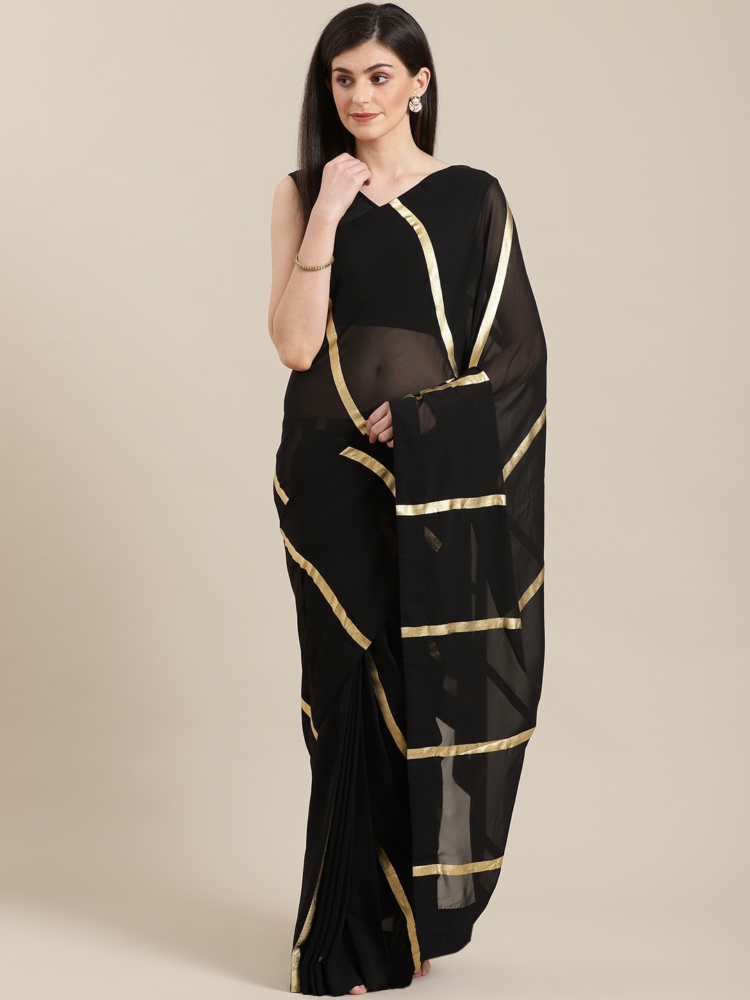 

Ahalyaa Black & Golden Striped Ready to Wear Saree