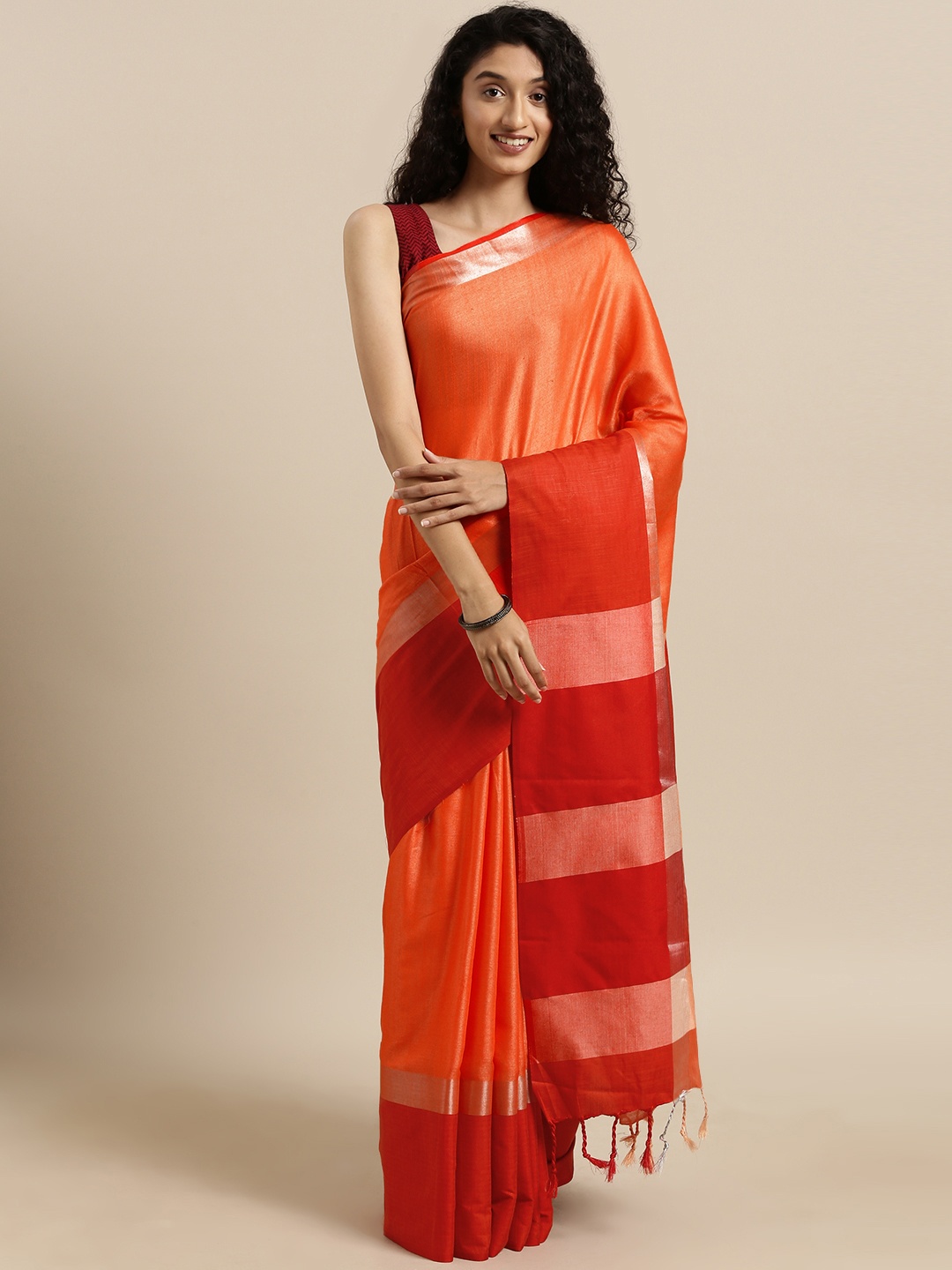 

VASTRANAND Orange Linen Blend Solid Saree