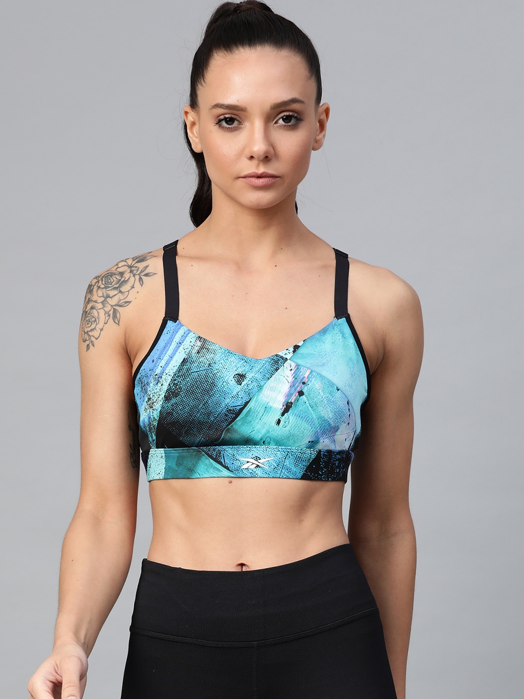 

Reebok Teal & Black Printed Non-Wired Lightly Padded TS HERO URBAN Sports Bra FJ2898