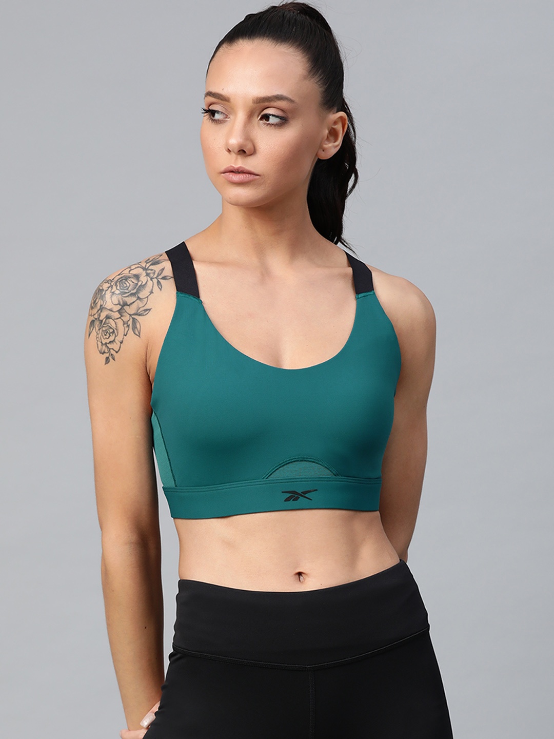 

Reebok Teal Green Solid Non-Wired Lightly Padded Sports Bra FI6837
