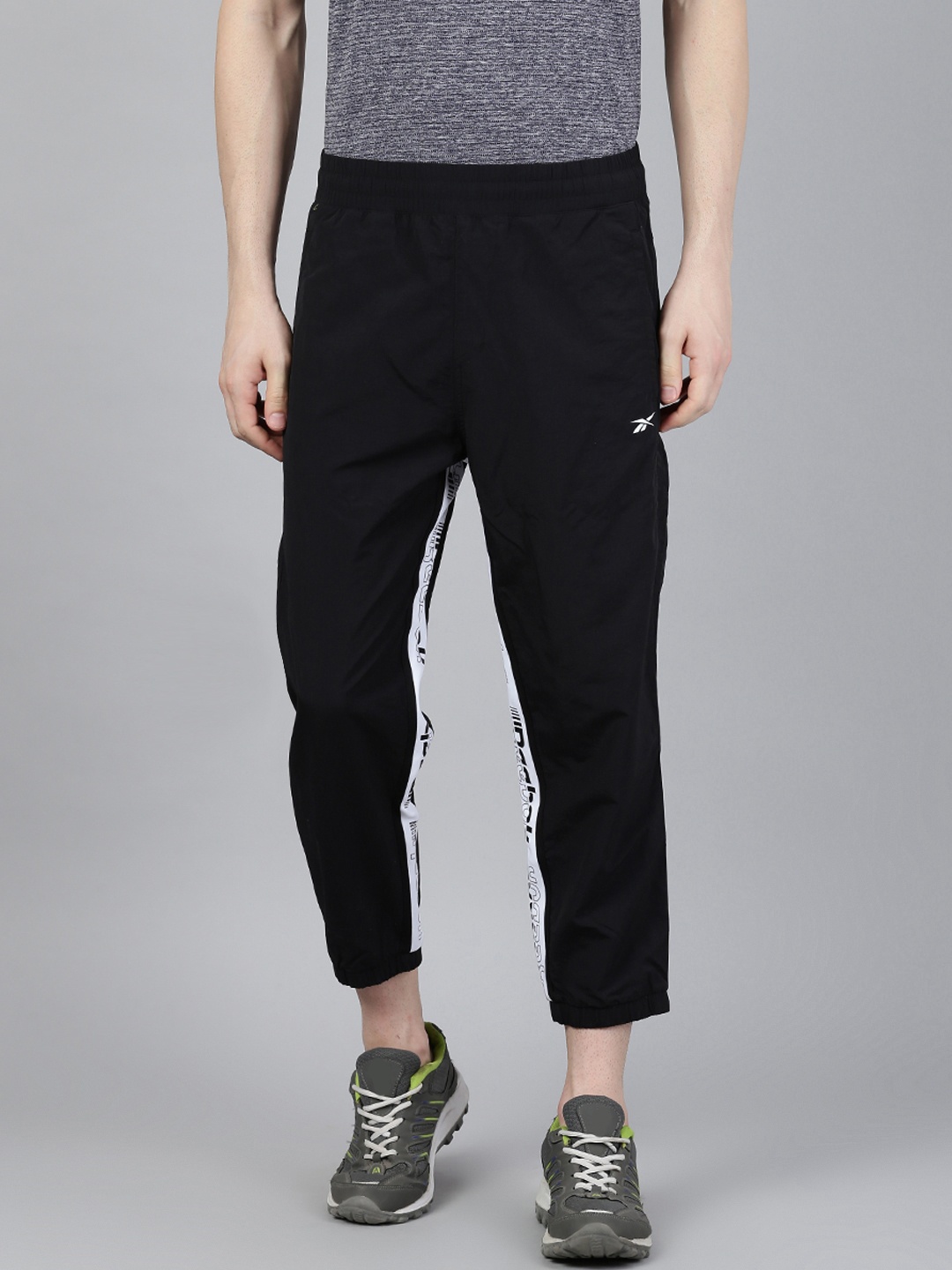 

Reebok Men Black Solid Training Meet You There 7/8 Pants