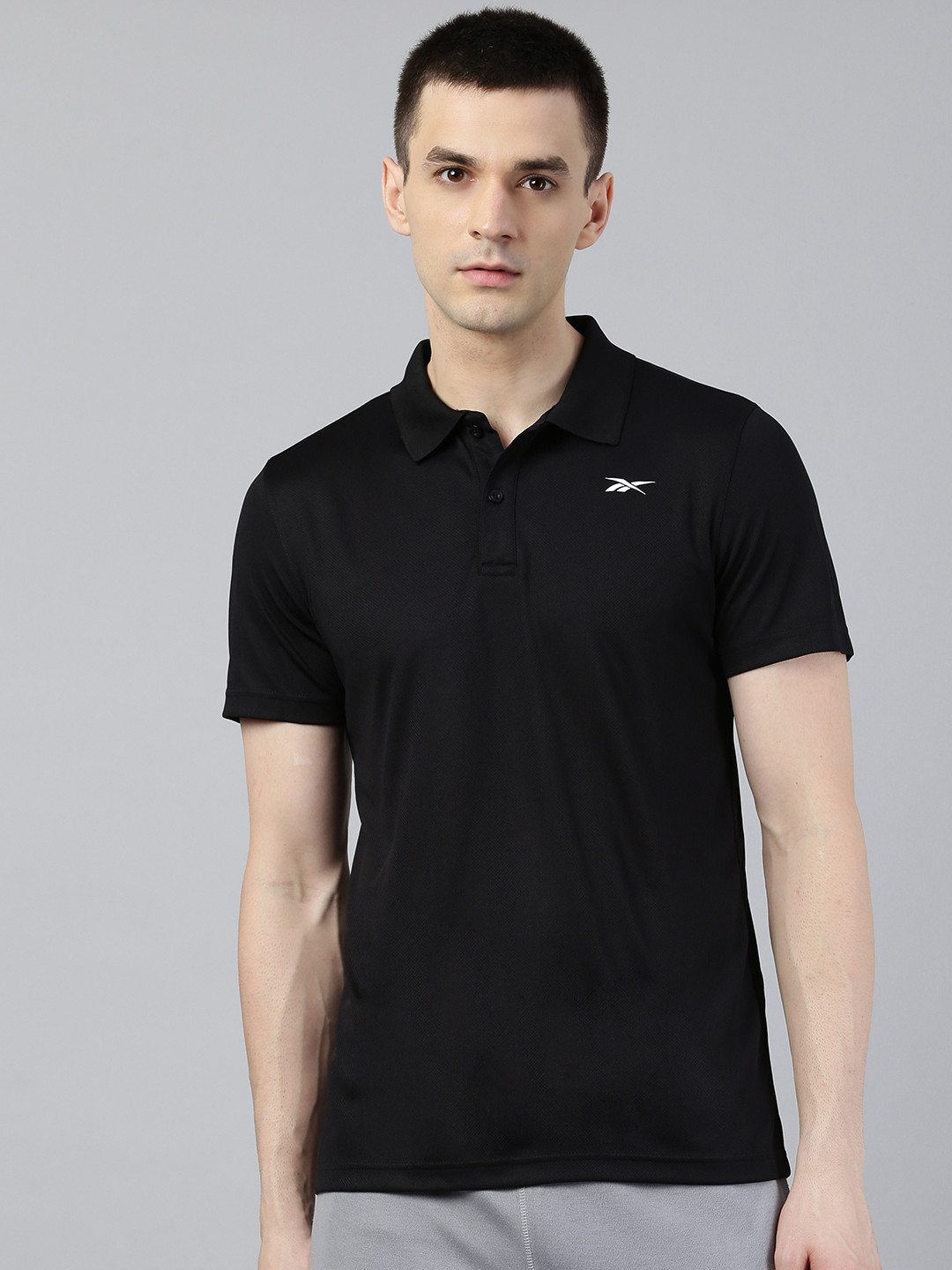 

Reebok Men Black Solid Power Mesh Polo Training T-shirt