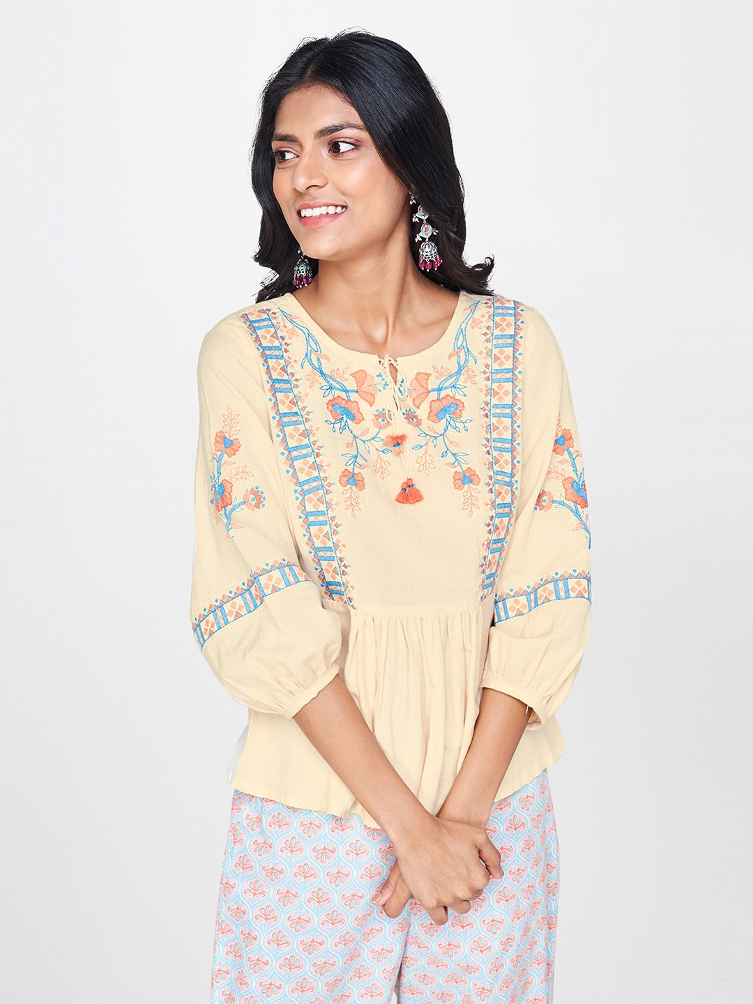 

Global Desi Women Cream-Coloured Embroidered Puff Sleeve A-Line Top