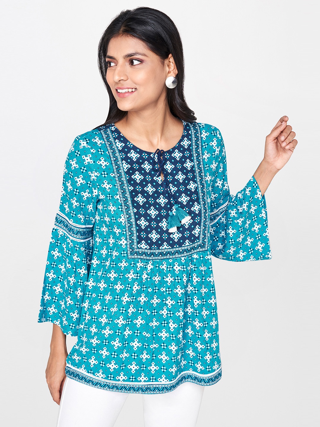 

Global Desi Women Blue Printed Bell Sleeve Top With Lace Inserts