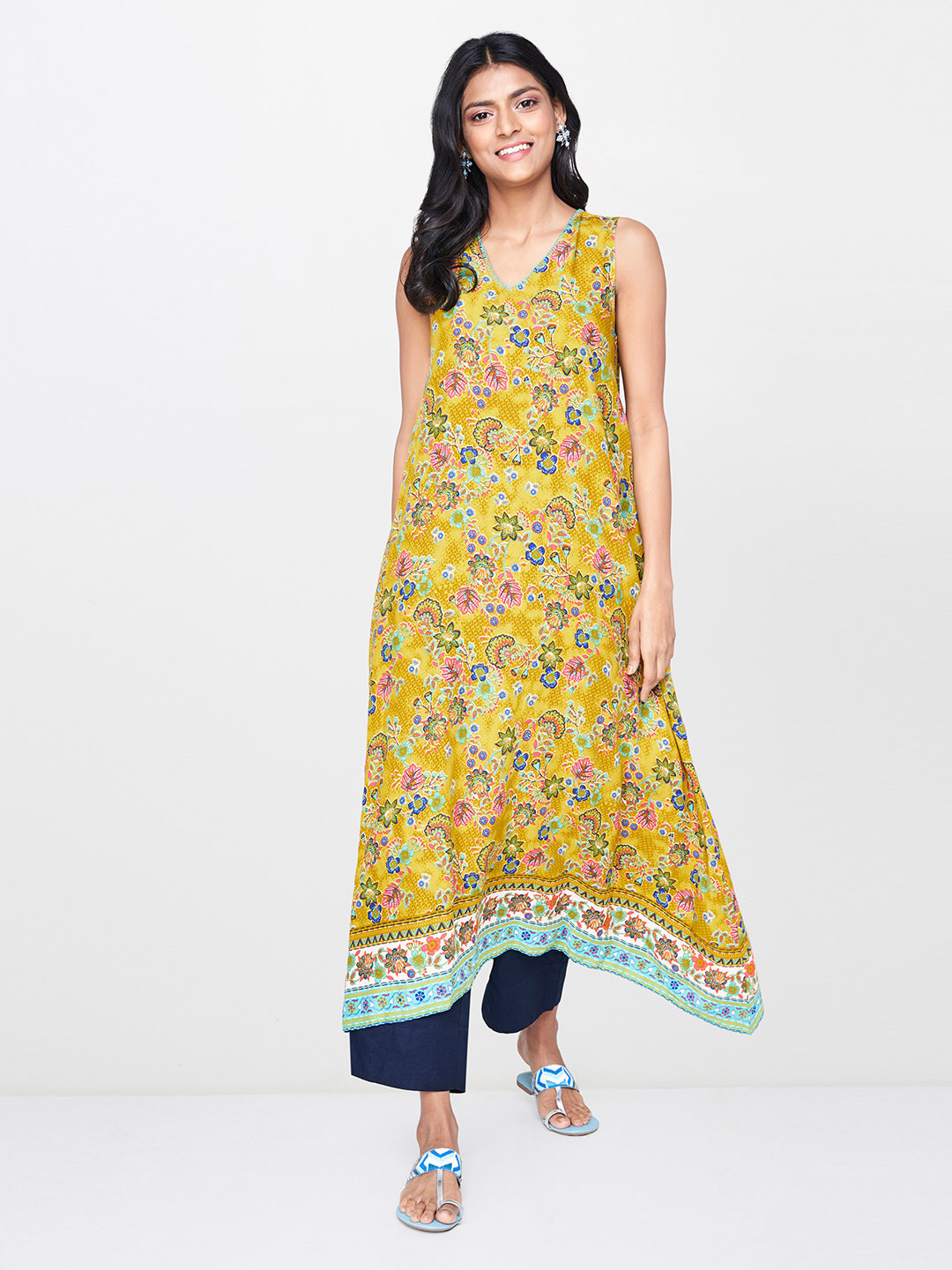

Global Desi Women Mustard Yellow Printed Asymmetric A-Line Kurta
