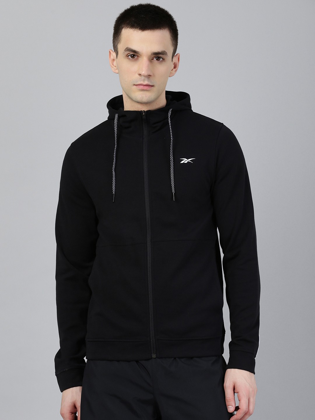 

Reebok Men Black Solid Workout Ready Hooded Sweatshirt
