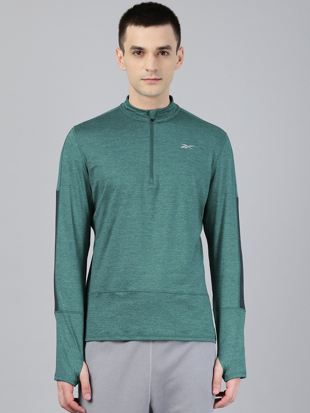 

Reebok Men Green Solid Essentials Quarter Zip Running Hooded Sweatshirt