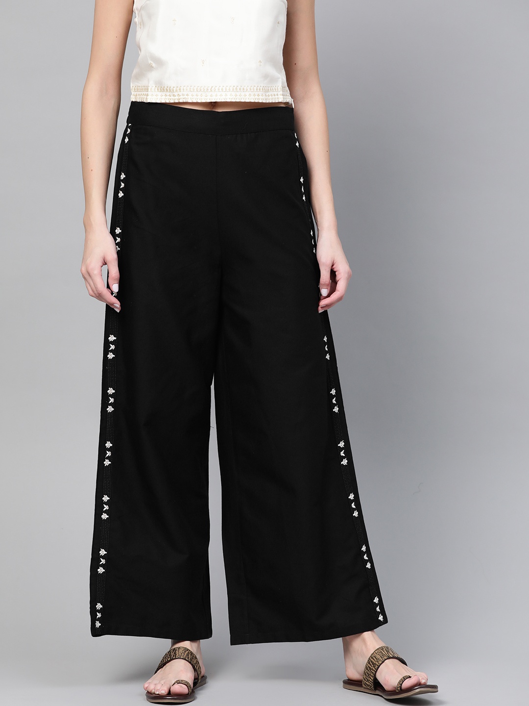 

W Women Black Solid Flared Palazzos