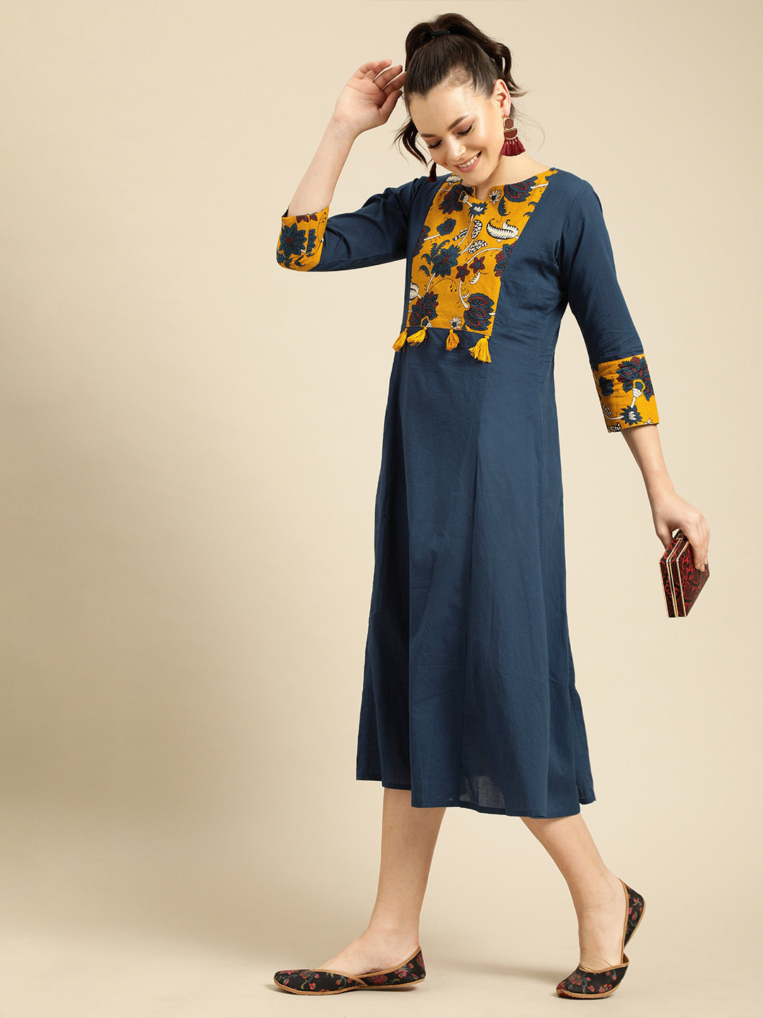 

Varanga Women Navy Blue & Mustard Yellow Printed A-Line Dress With Tassel Detail