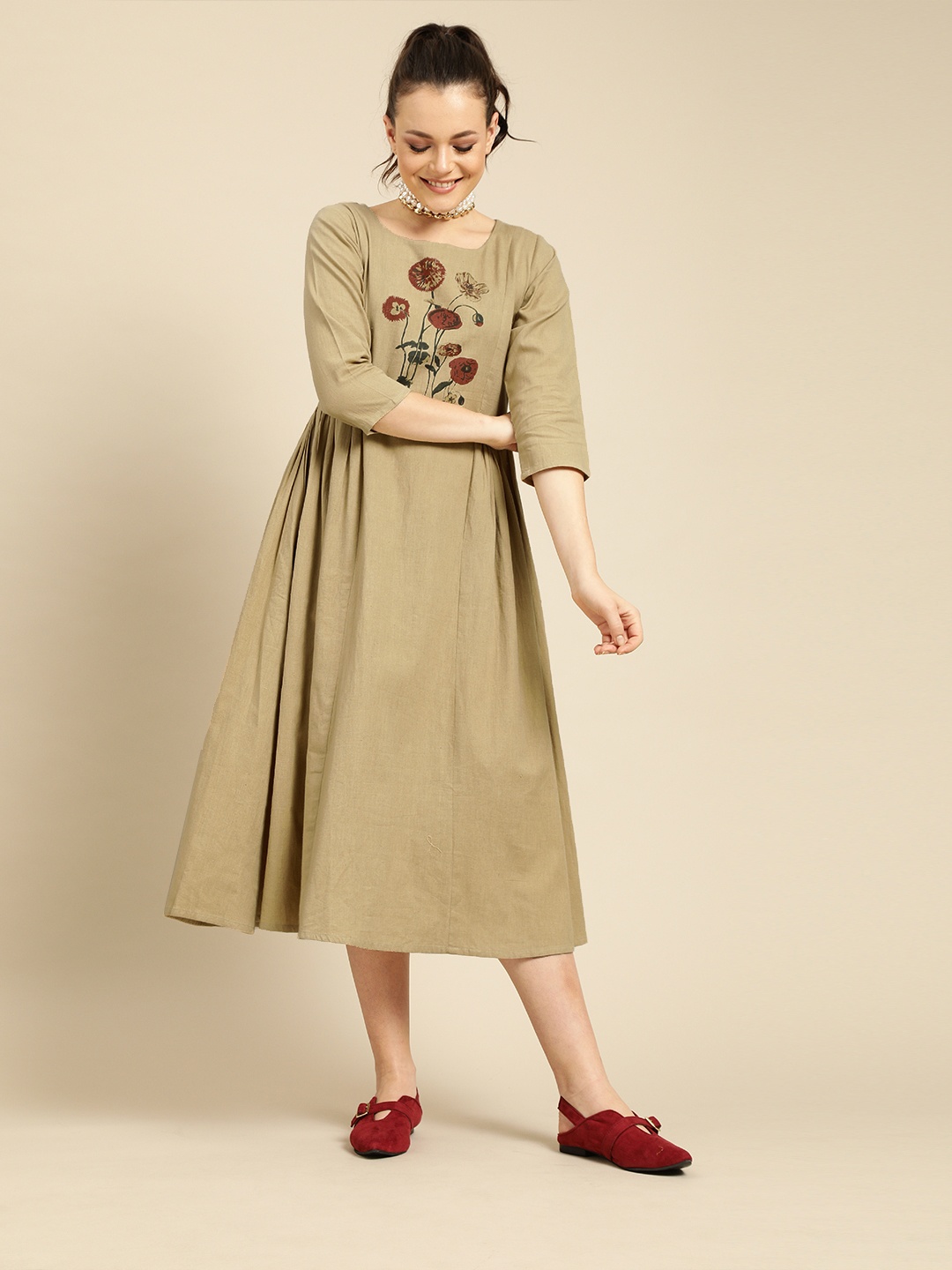 

Varanga Women Beige Printed Fit and Flare Dress With Gathered Detail
