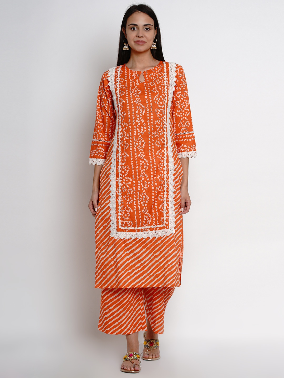 

Bhama Couture Women Orange & White Printed Kurta with Palazzos