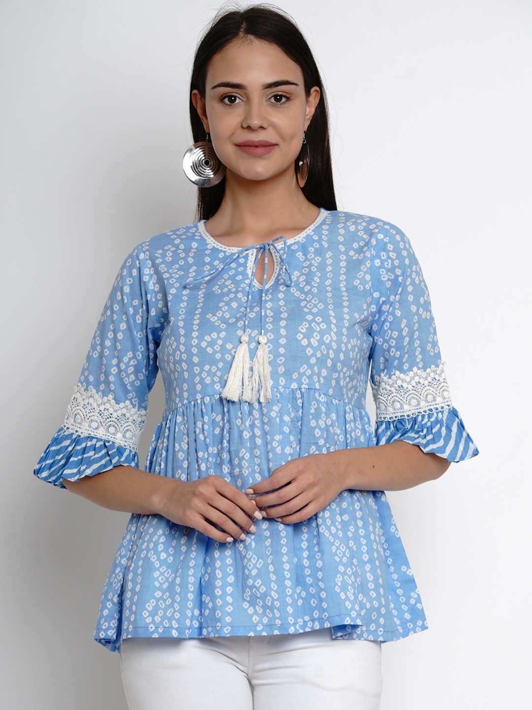 

Bhama Couture Women Blue & White Printed Empire Top