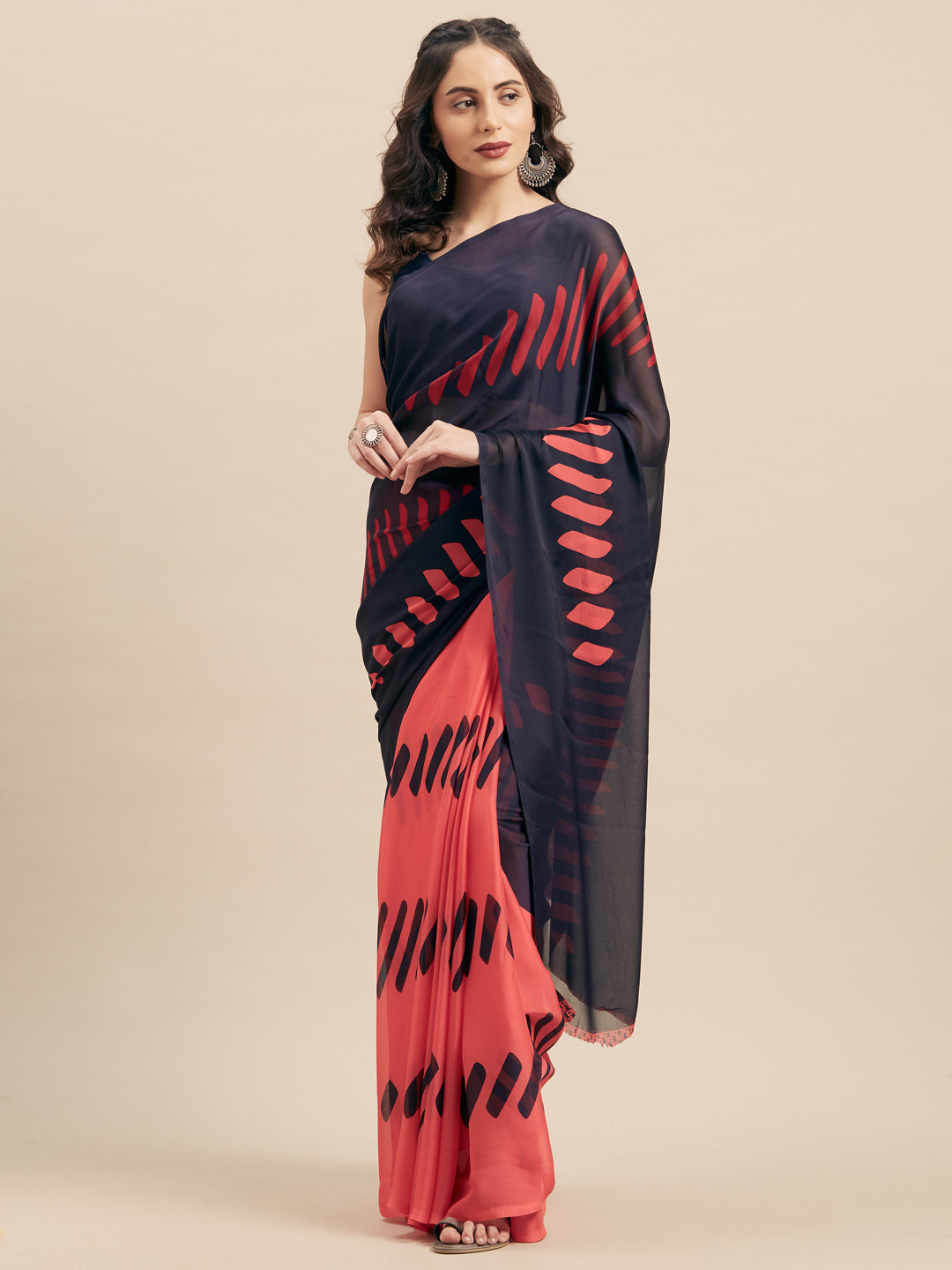 

Mitera Coral Pink & Navy Blue Poly Georgette Printed Saree