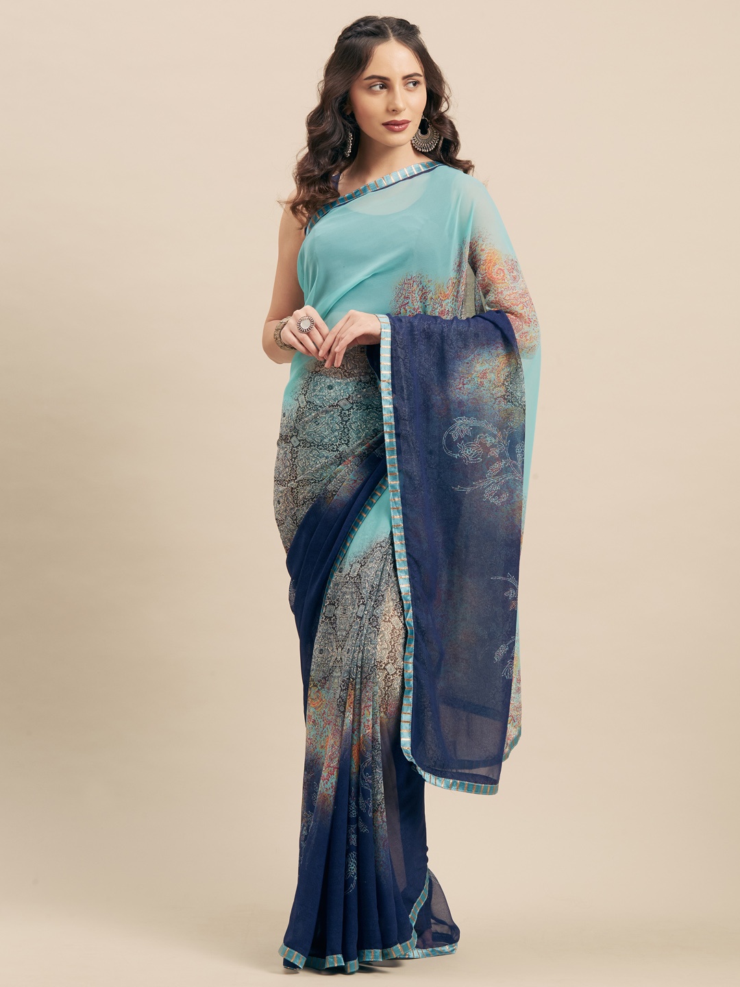 

Mitera Blue Printed Poly Georgette Saree