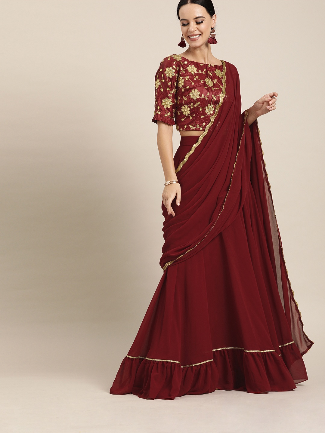 

Inddus Maroon Solid Poly Georgette Lehenga Saree