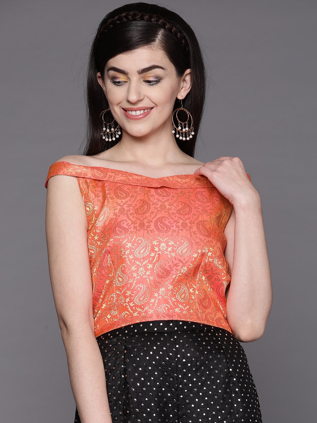 

Inddus Women Orange & Golden Self Design Top