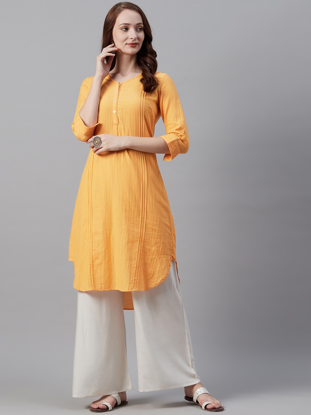 

Biba Women Mustard Yellow Solid Straight Kurta