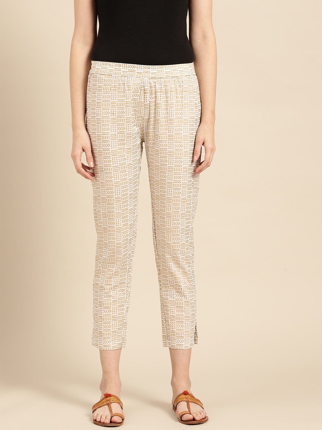 

Varanga Women White & Golden Regular Fit Printed Cropped Trousers