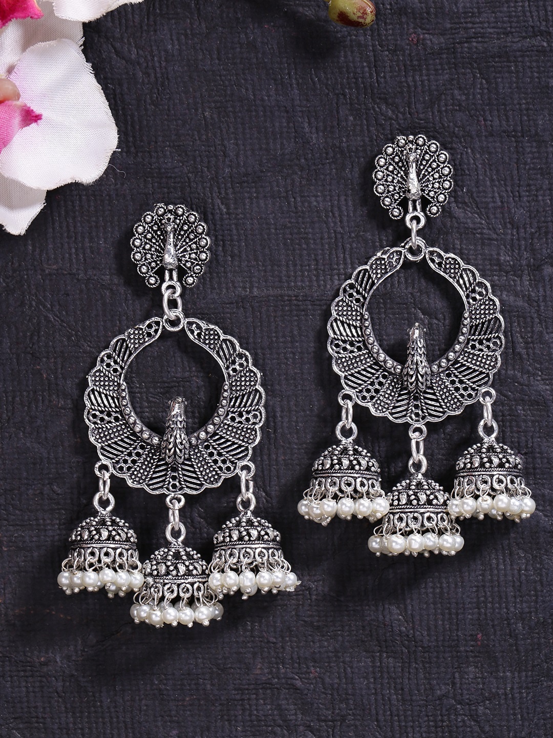 

Fida Silver-Toned Peacock Shaped Oxidised Jhumkas