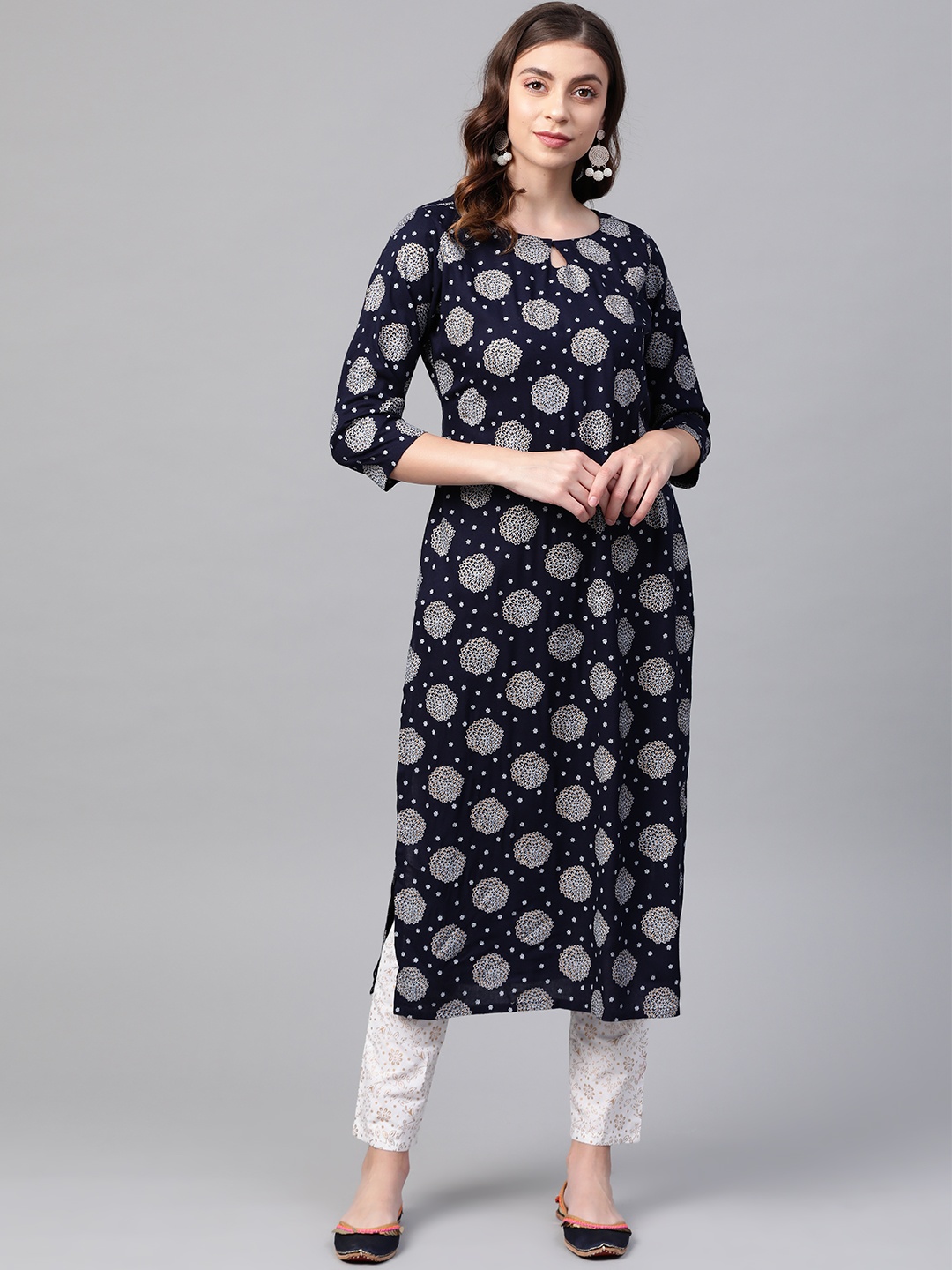 

Ives Women Navy Blue & White Printed Kurta with Trousers