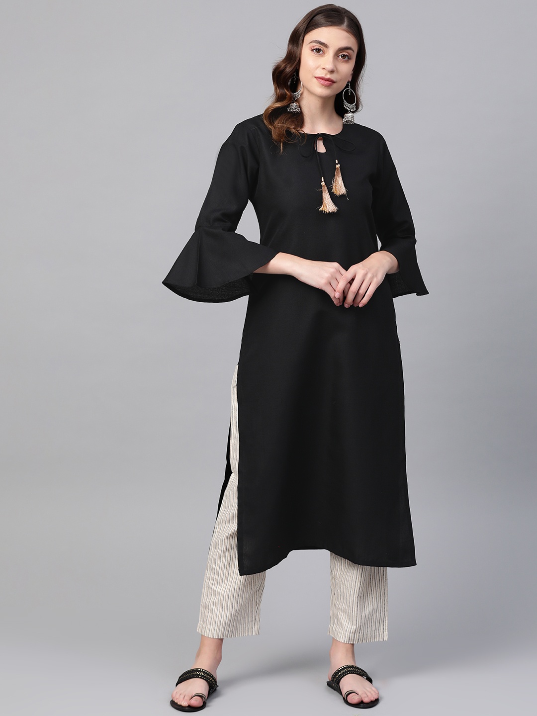 

KSUT Women Black Solid Kurta with Trousers