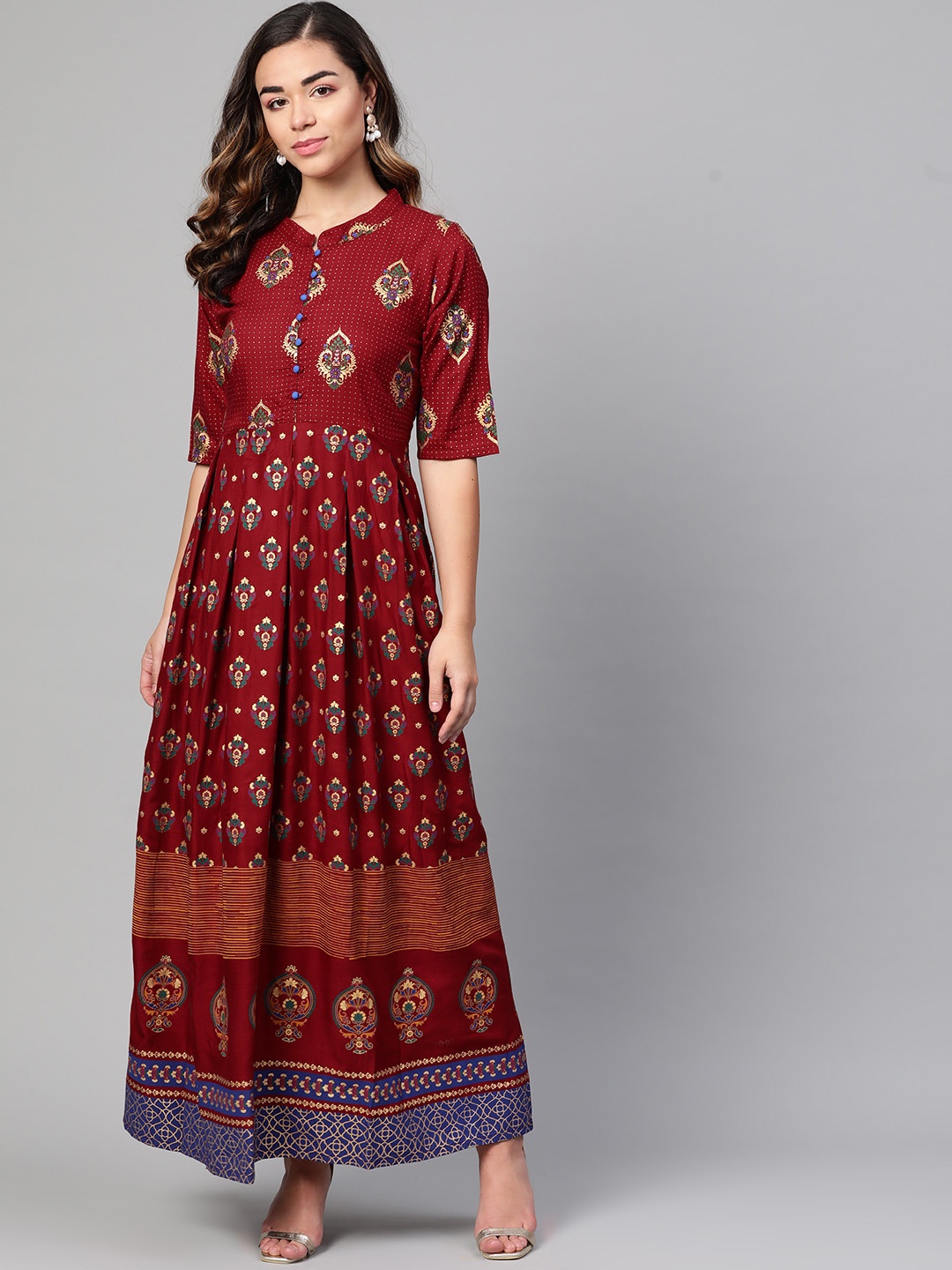 

Myshka Maroon & Golden Ethnic Motifs Printed Cotton Maxi Dress
