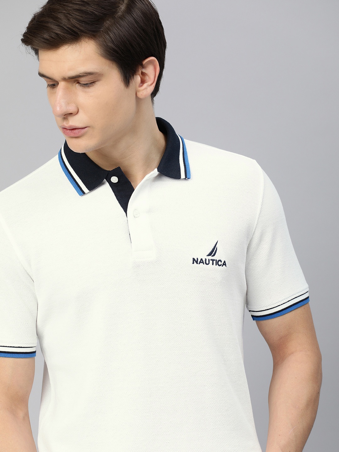 

Nautica Men White Solid Polo Collar Pure Cotton T-shirt with Embroidery