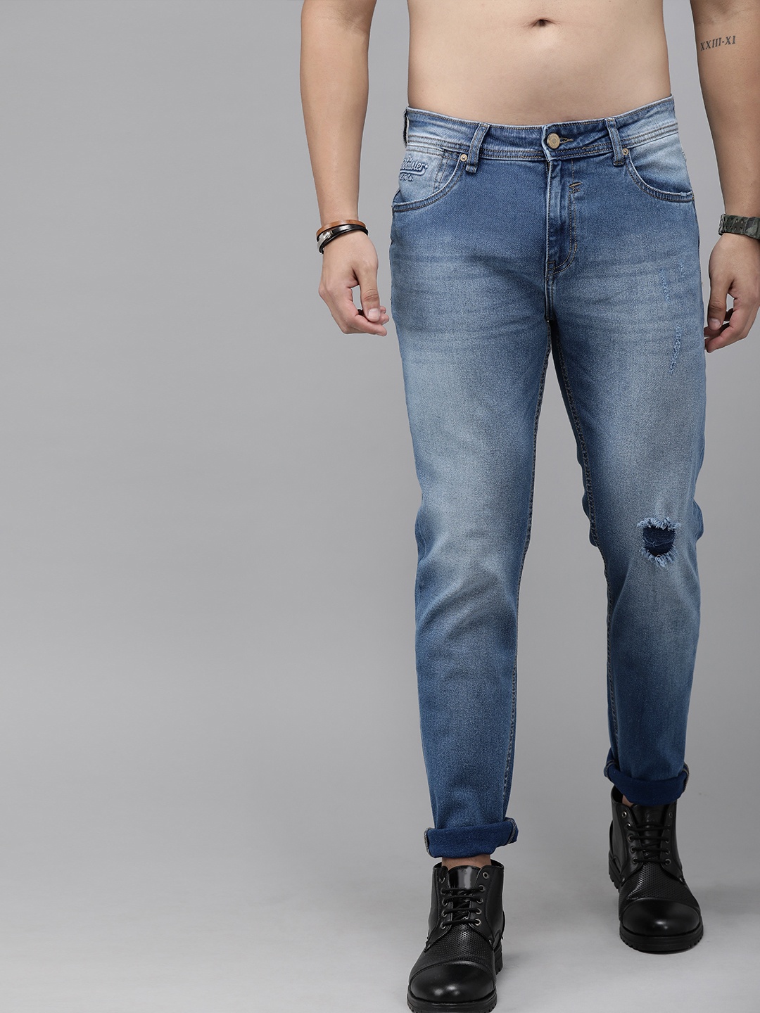 

Roadster Men Blue Slim Tapered Fit Mid-Rise Low Distress Stretchable Jeans