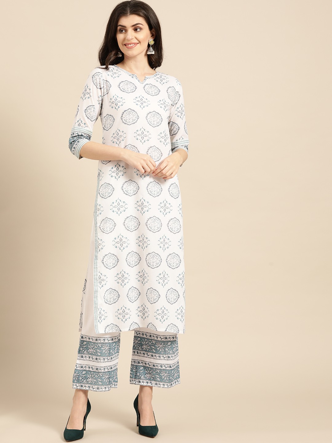 

Varanga Women White & Blue Printed Kurta with Palazzos