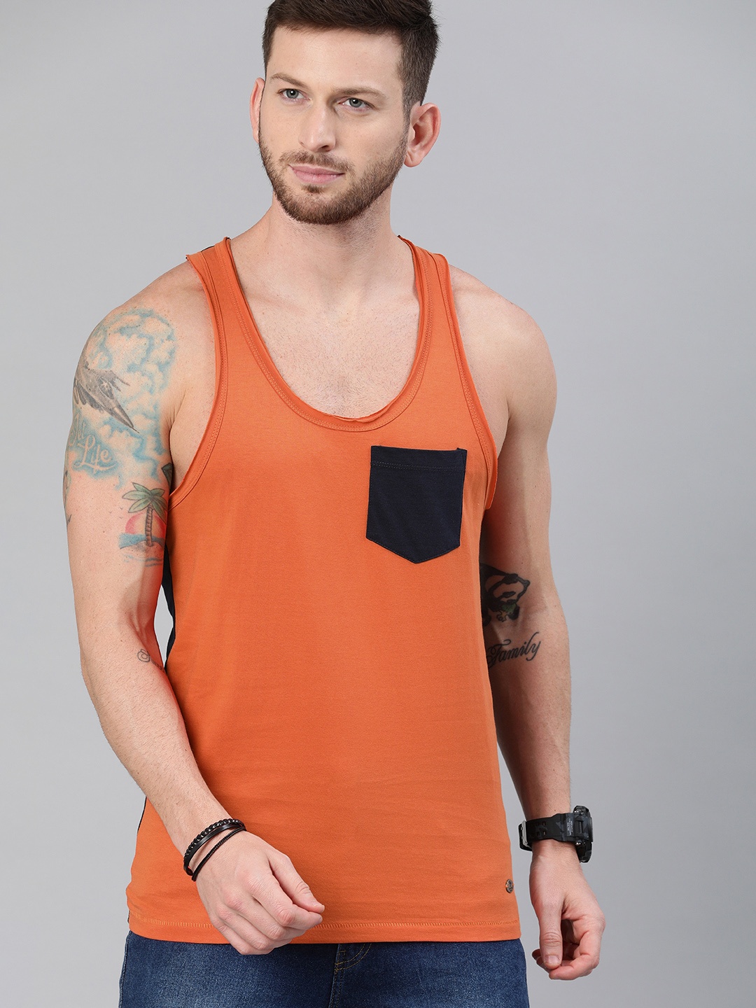 

Roadster Men Orange Solid Scoop Neck Pure Cotton T-shirt With Chest Pocket