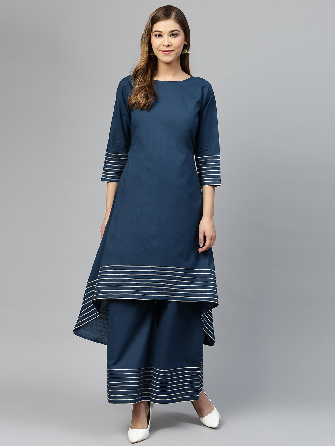

Silai Bunai Women Navy Blue Solid High-Low Kurta with Palazzos