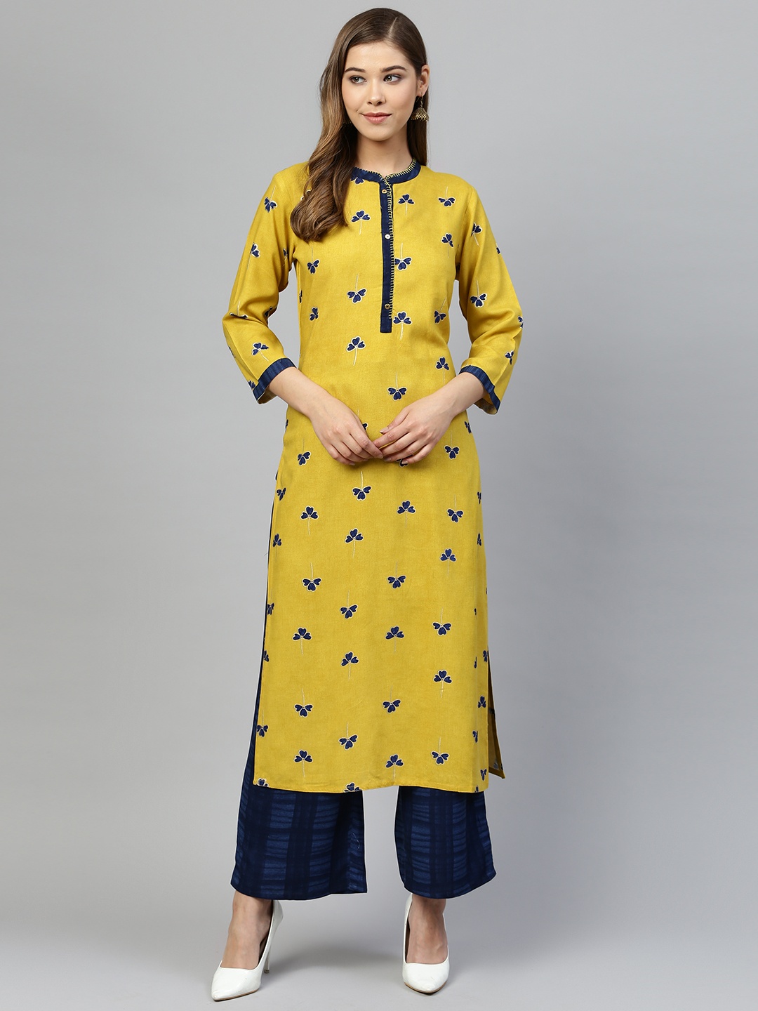 

Silai Bunai Women Mustard Yellow & Navy Blue Printed Kurta with Palazzos