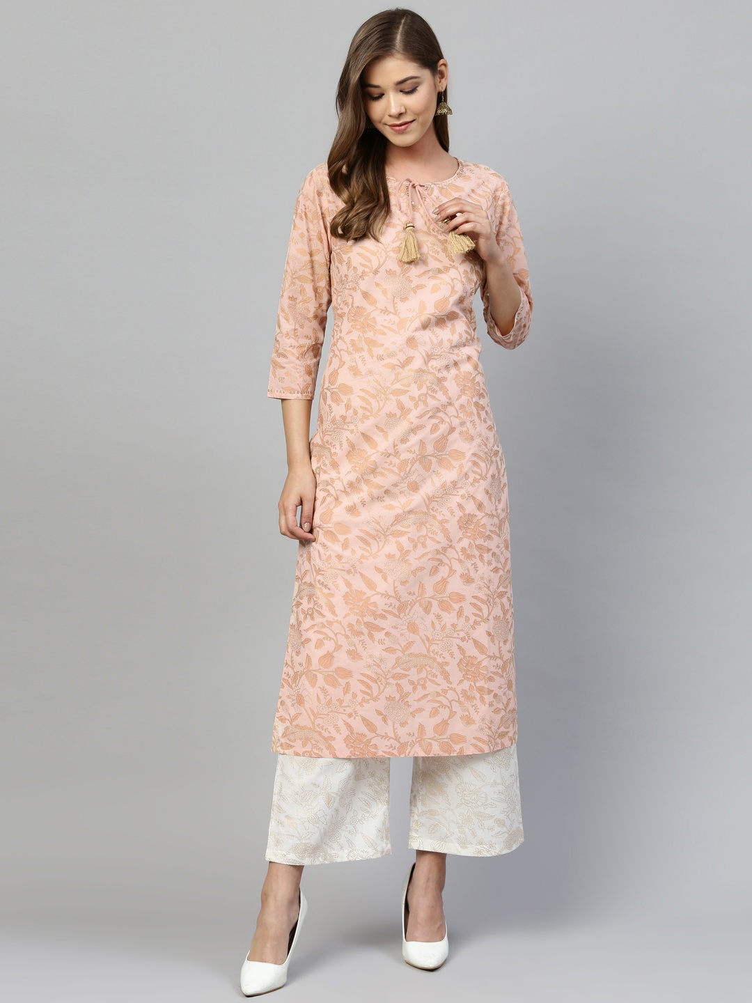 

Silai Bunai Women Peach-Coloured & Off-White Printed Kurta with Palazzos