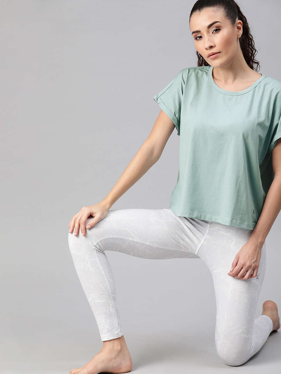 

Hrx By Hrithik Roshan Women Solid Lycra Yoga Tshirts, Sea green