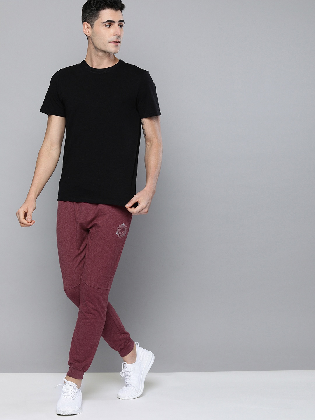 

HRX by Hrithik Roshan Men Burgundy Melange Solid Slim Fit Training Jogger