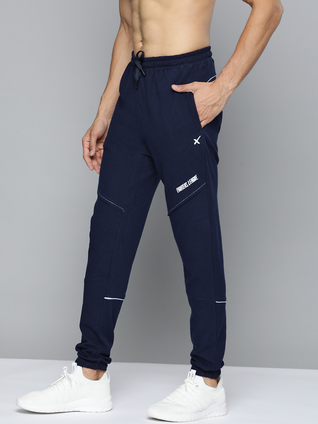 

HRX by Hrithik Roshan Men Navy Solid Tapered Fit Bio-Wash Lifestyle Joggers, Navy blue