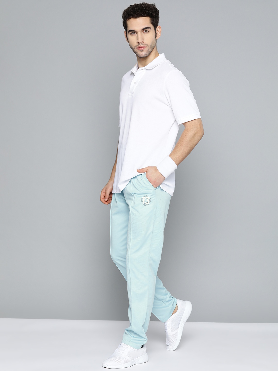 

HRX by Hrithik Roshan Men Blue Solid Regular Fit Rapid Dry Cricket Track Pants