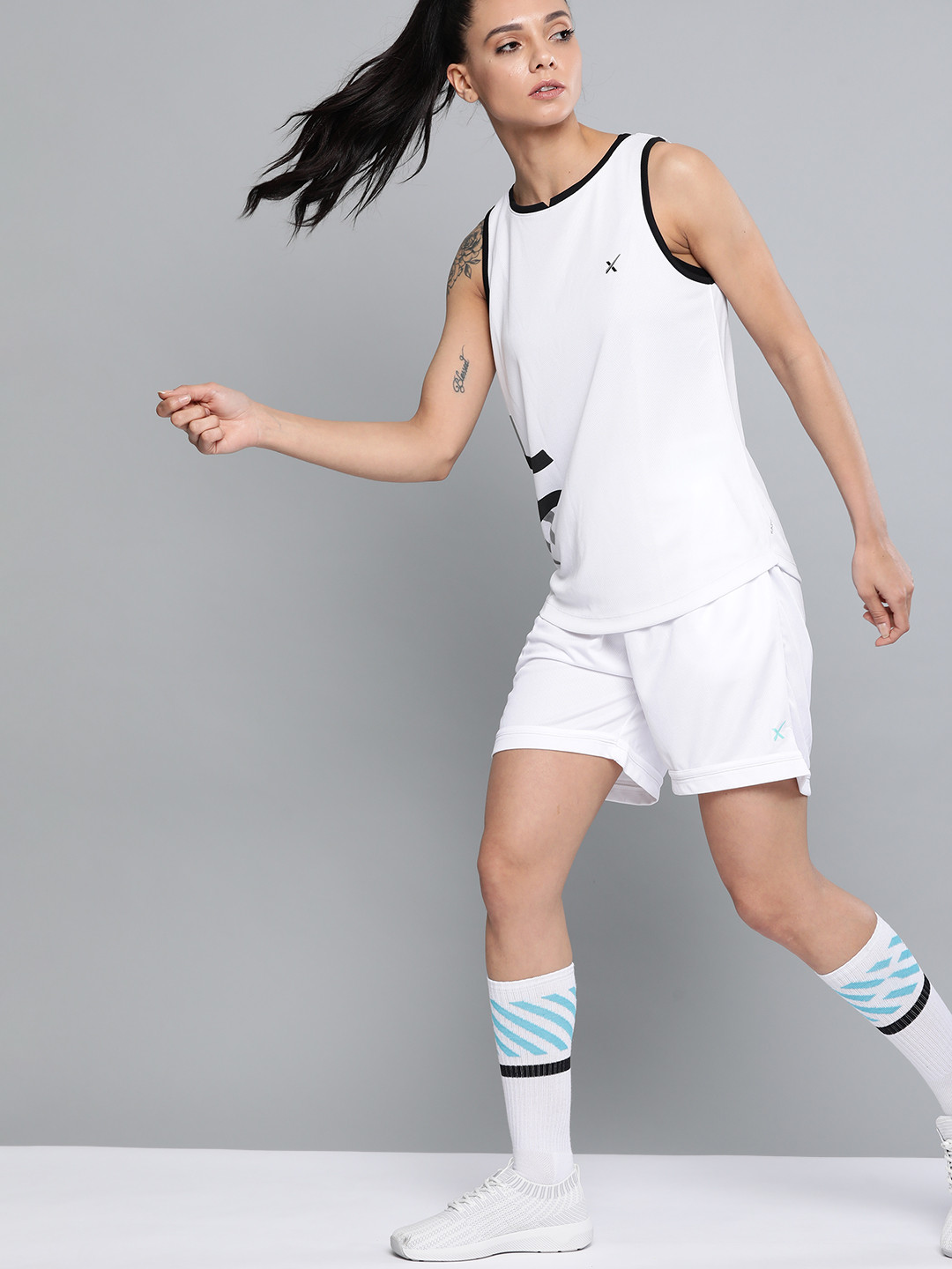 

HRX by Hrithik Roshan Women White Solid Regular Fit Rapid Dry Racket Sports Shorts