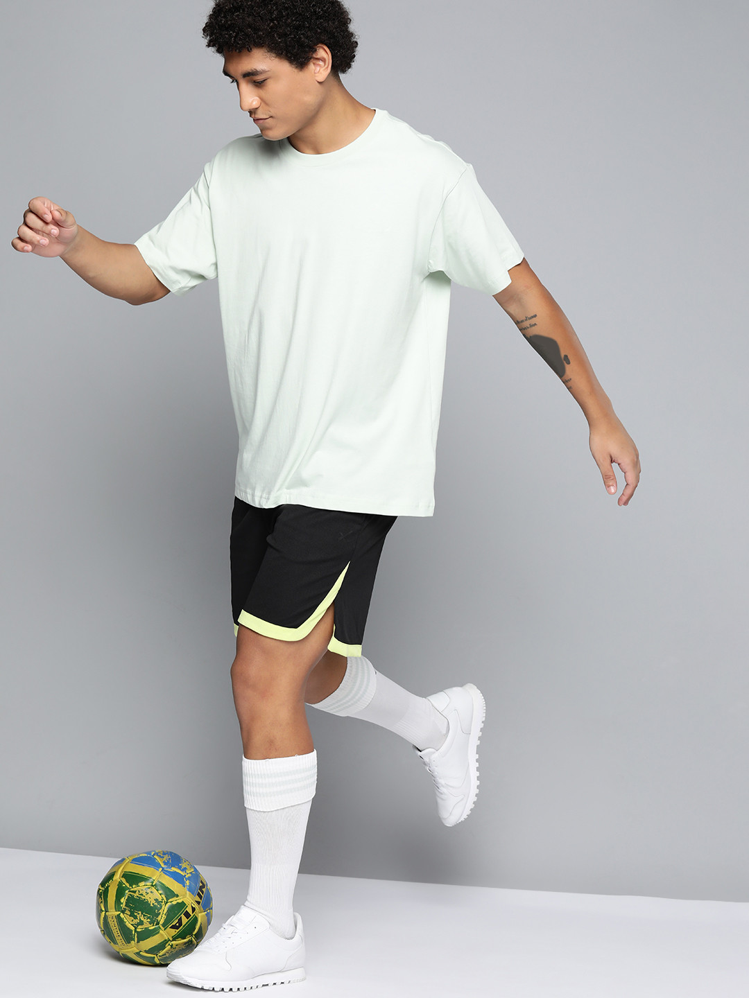 

HRX by Hrithik Roshan Men Black Solid Regular Fit Rapid Dry Football Shorts