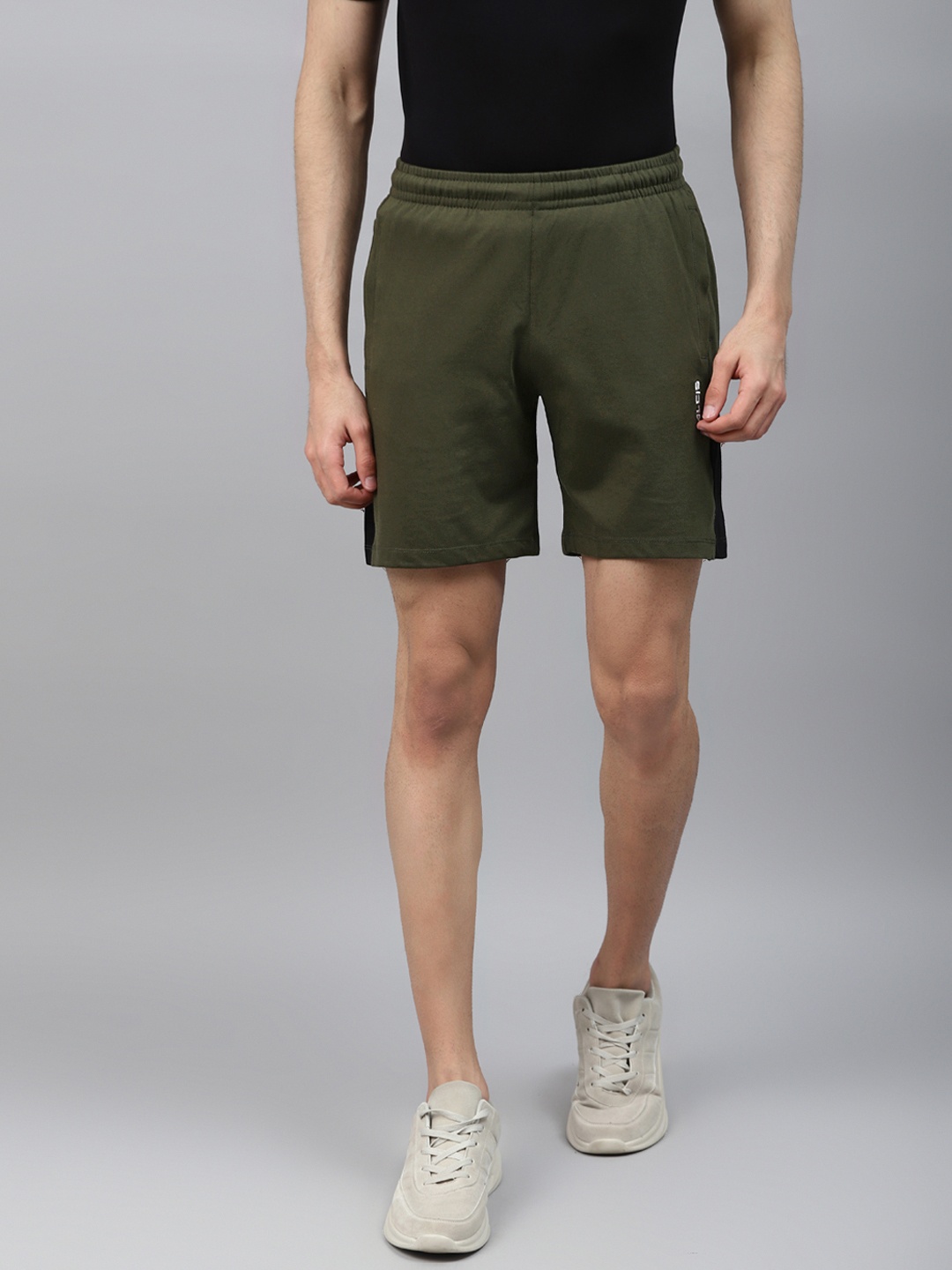 

Alcis Men Olive Green Solid Regular Fit Sports Shorts