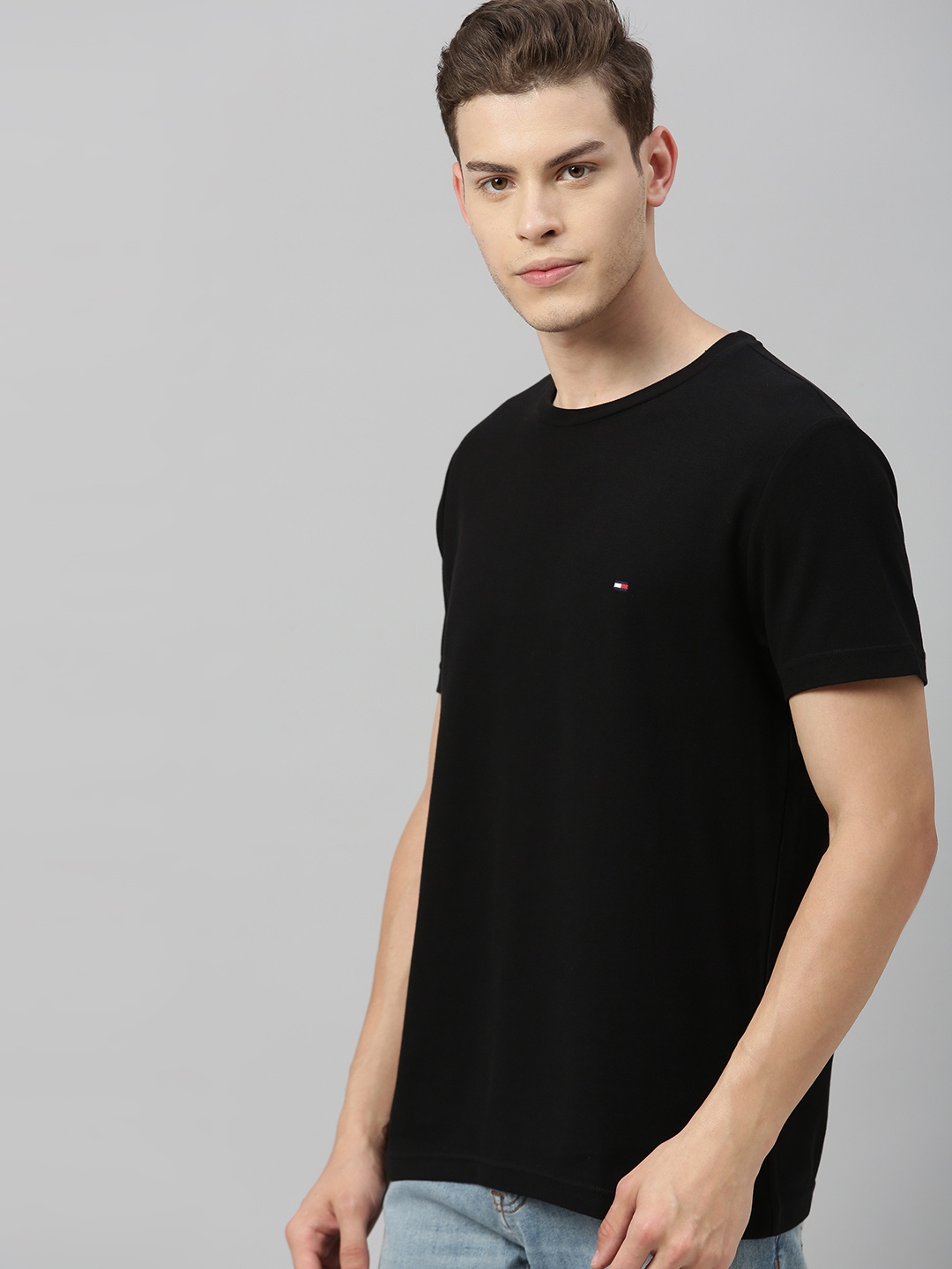 

Tommy Hilfiger Men Black Solid Round Neck Pure Cotton T-shirt