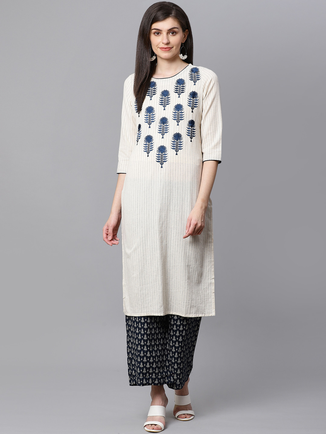 

Kifahari Women Off-White & Navy Blue Embroidered Kurta with Palazzos