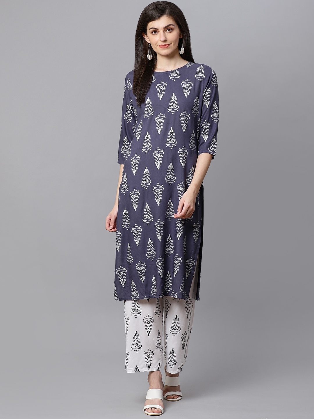 

Kifahari Women Blue & White Block Print Slim Fit Kurta with Palazzos